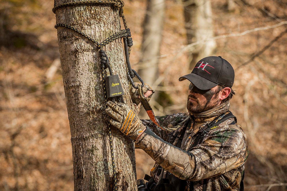 When climbing and hunting, keep the Prusik knot of your safety line just over head high. Image by Bill Konway / Headhunters