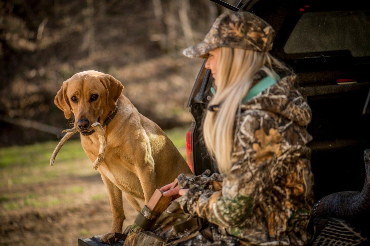 Well-behaved dogs can help you break the ice with land permission. © Bill Konway photo