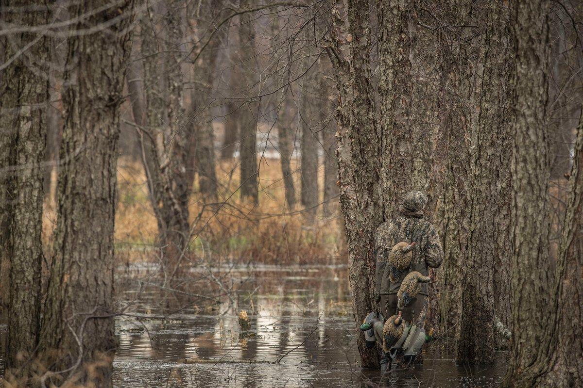 Merely hugging a tree while wearing Realtree Timber will make you invisible in some situations. During other hunts, you'll want 360 degrees of cover and overhead concealment. Photo © Bill Konway