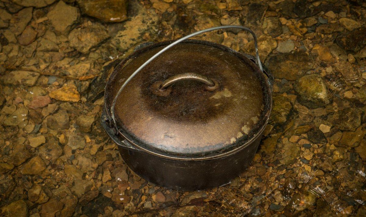 A 5-quart Dutch oven is perfect for cooking beans or stews over the fire. Photo B. Konway