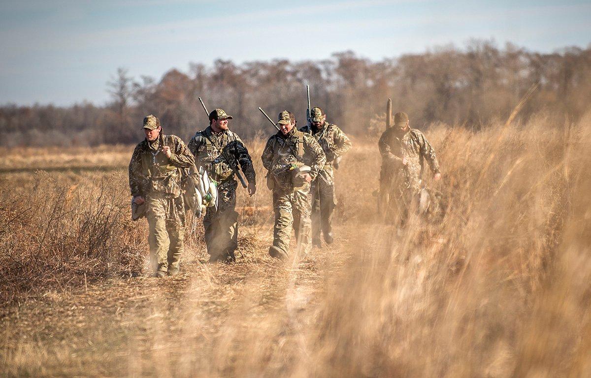 You won't shoot many ducks or geese if they can see you. And becoming invisible gets trickier with big groups. Photo © Bill Konway