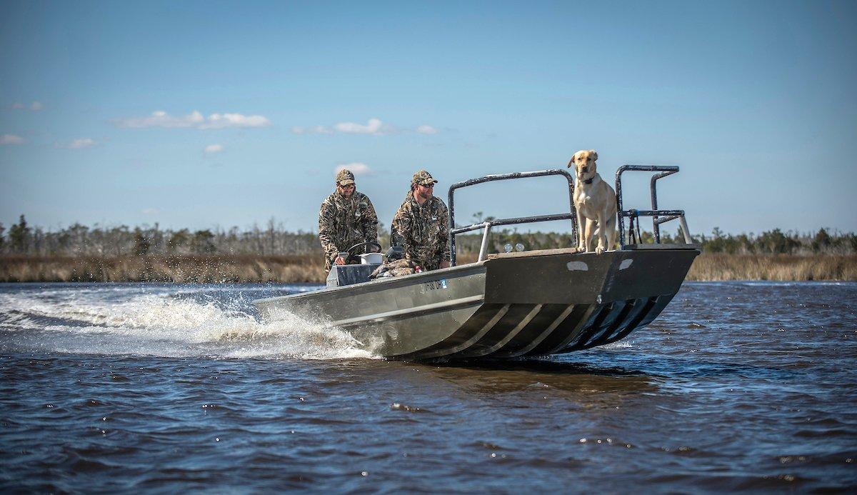 Ducks don't always loaf or fly in easy-to-view locations on big water. Sometimes, you must go find them. Photo © Bill Konway