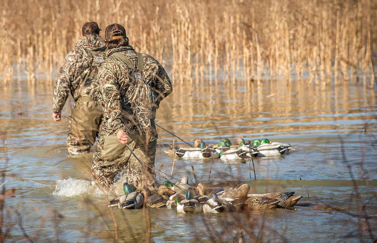 Many small waters have frozen, but hunters who can find open spots near food will likely cash in. Photo © Bill Konway