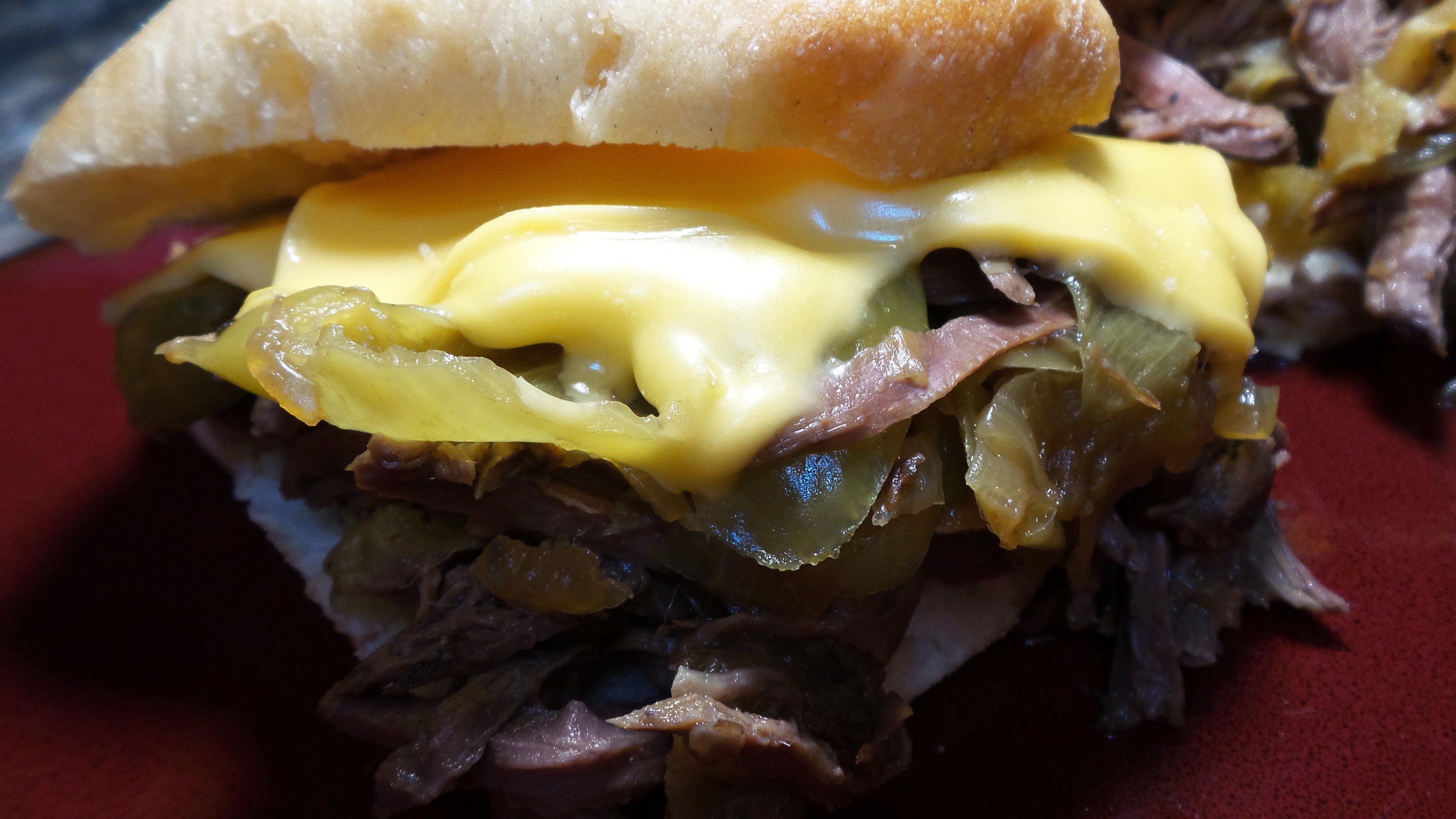 Serve the venison on a nice bun and top with a slice of cheese.