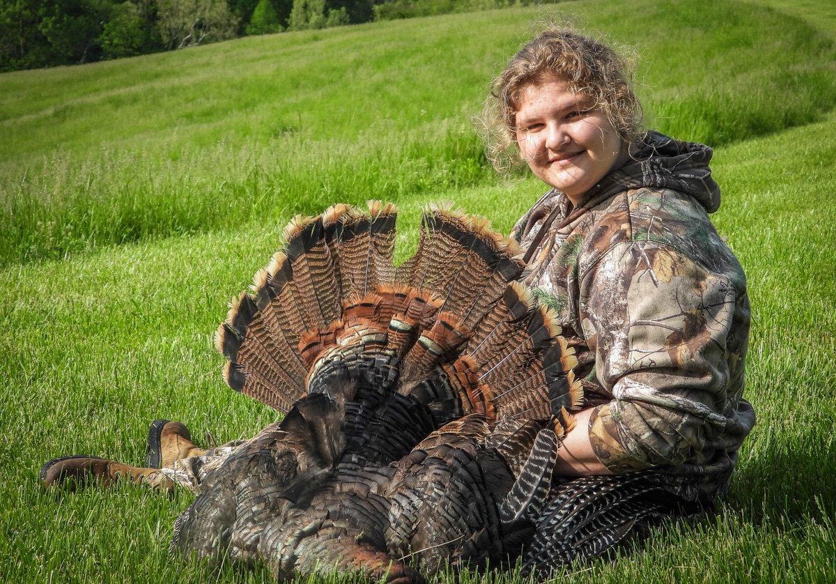 A happy Michaela Pendley with her Kentucky youth-hunt turkey. © Michael Pendley photo