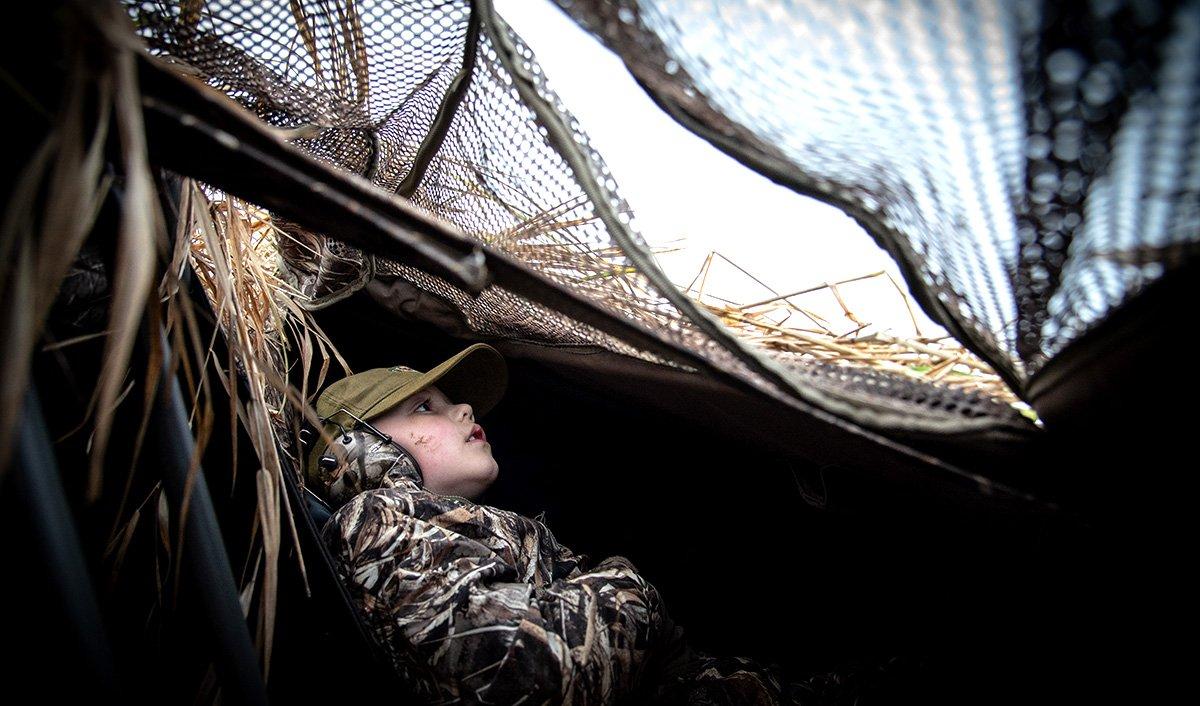 Experienced hunters often take the sights and smells of the marsh for granted. Not so with newcomers. Photo © Mike Reed