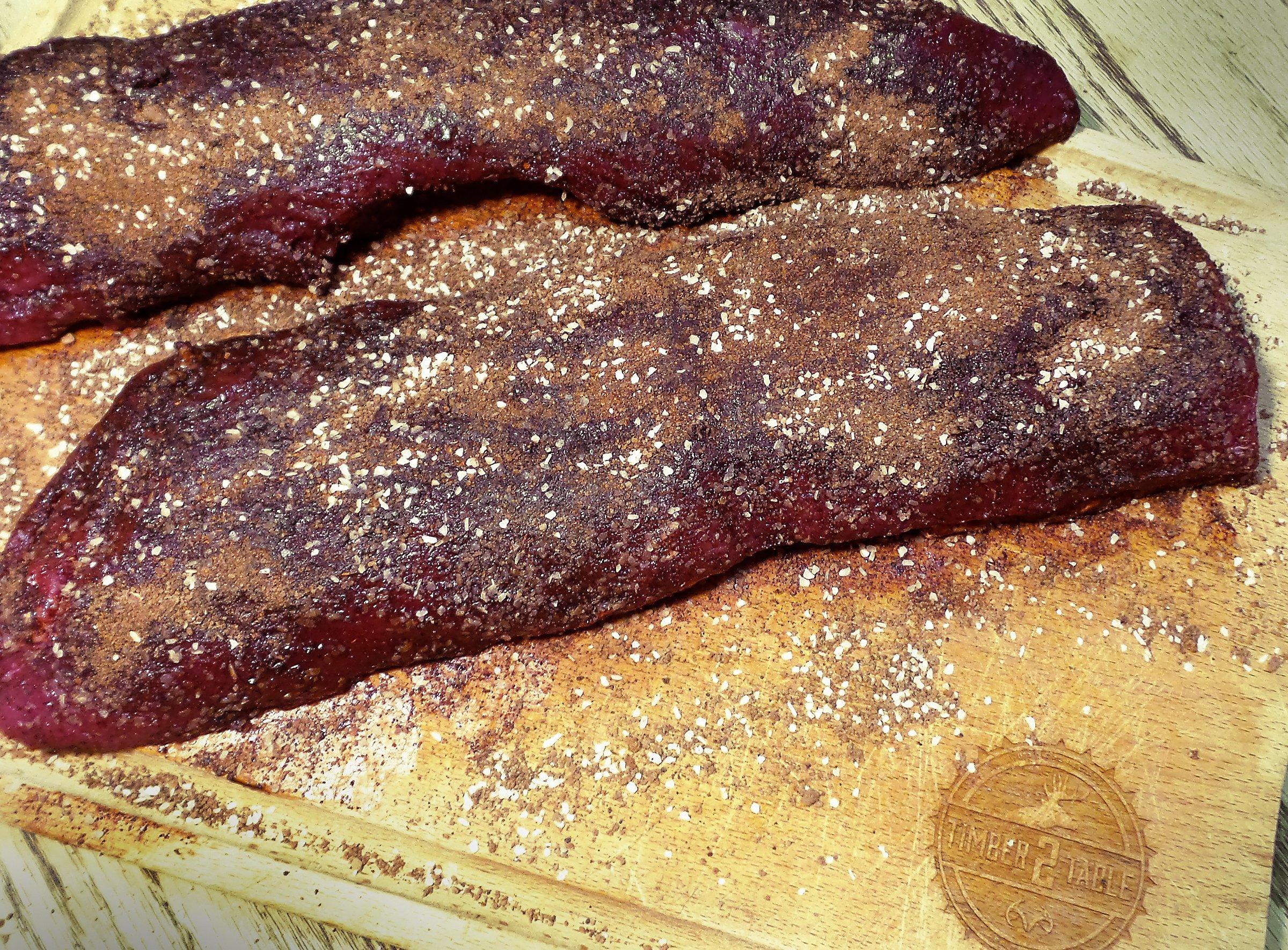 Coat the backstrap with the dry rub.