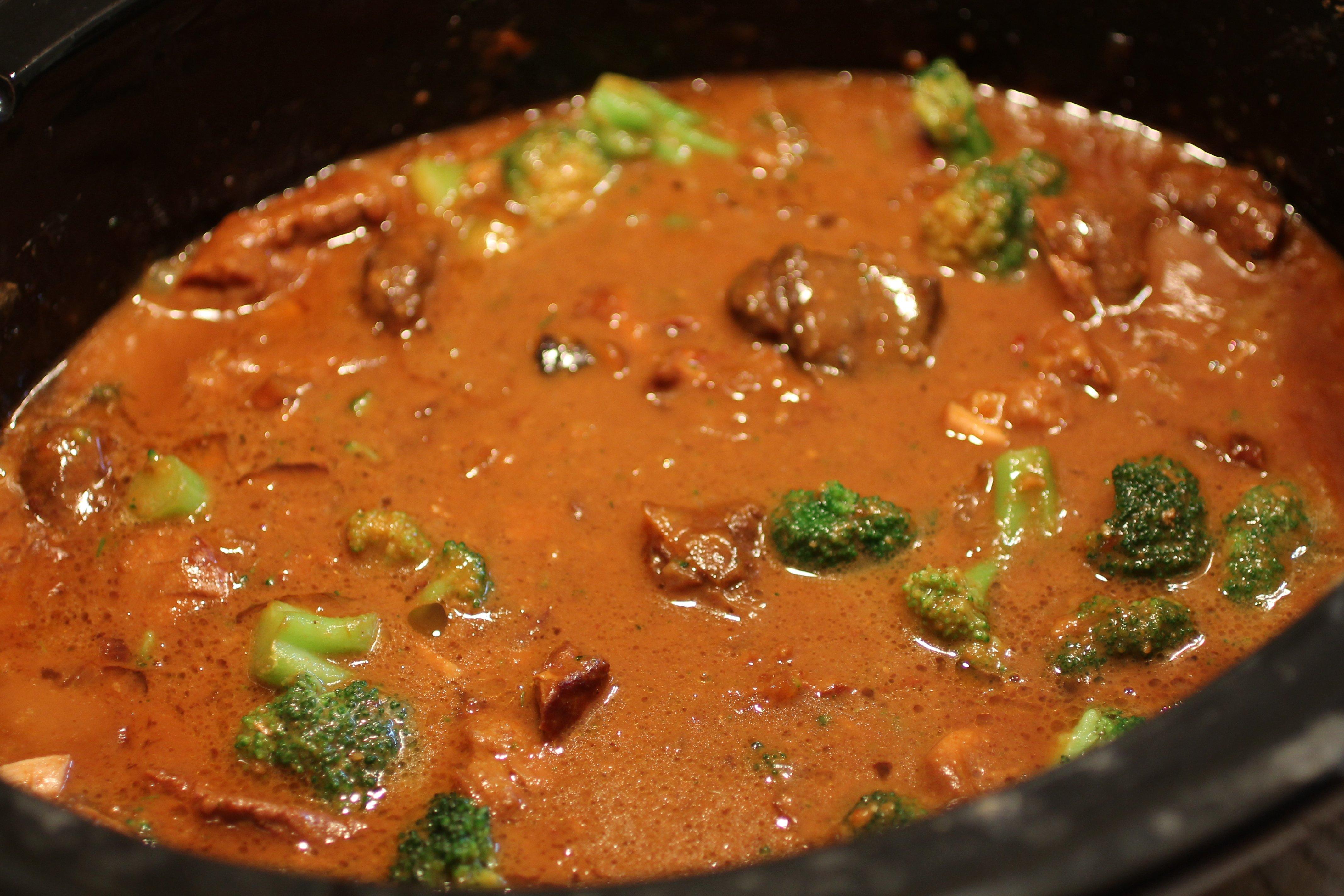 Add steamed broccoli at the end of the cooking process.