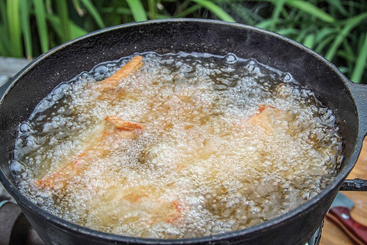 Deep fry in hot oil until cooked through and golden brown.