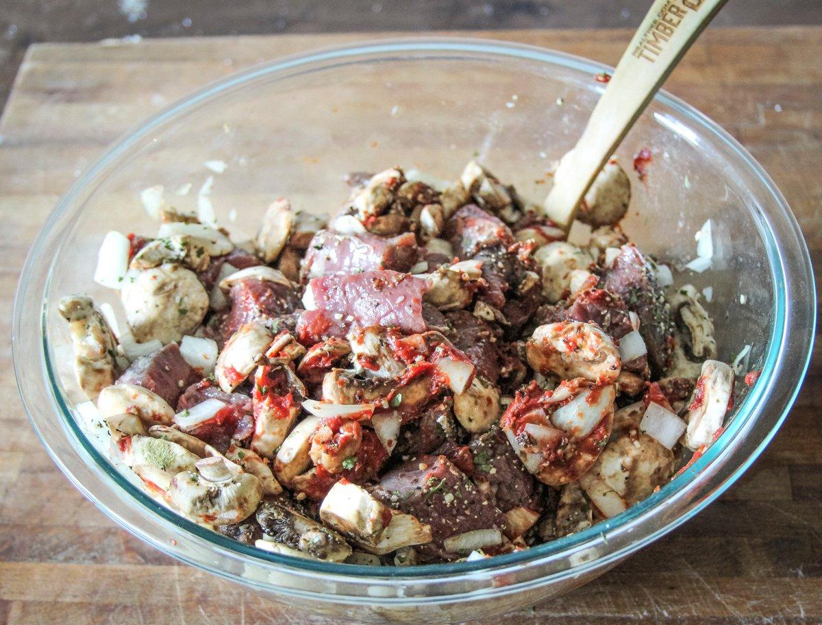 Mix the venison, onions, mushrooms and seasonings in a large bowl.