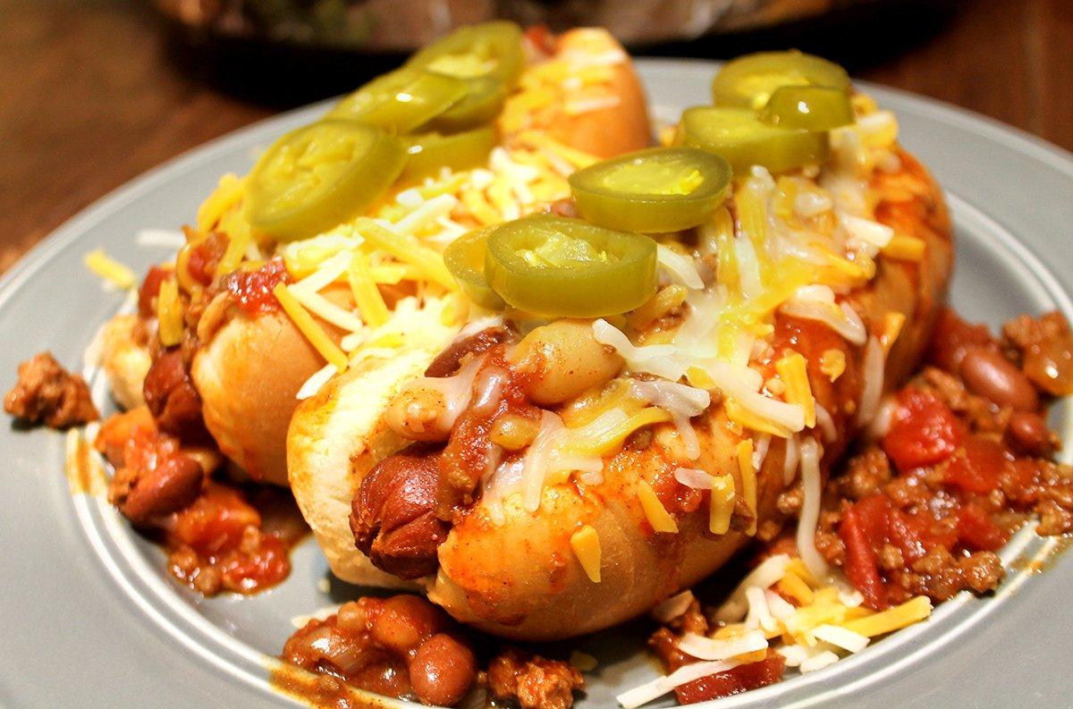 Top the dogs any way you wish, but shredded cheese and jalapenos hit the spot.