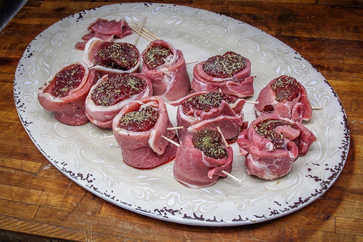 Wrap each piece of backstrap with country ham and secure with toothpick.