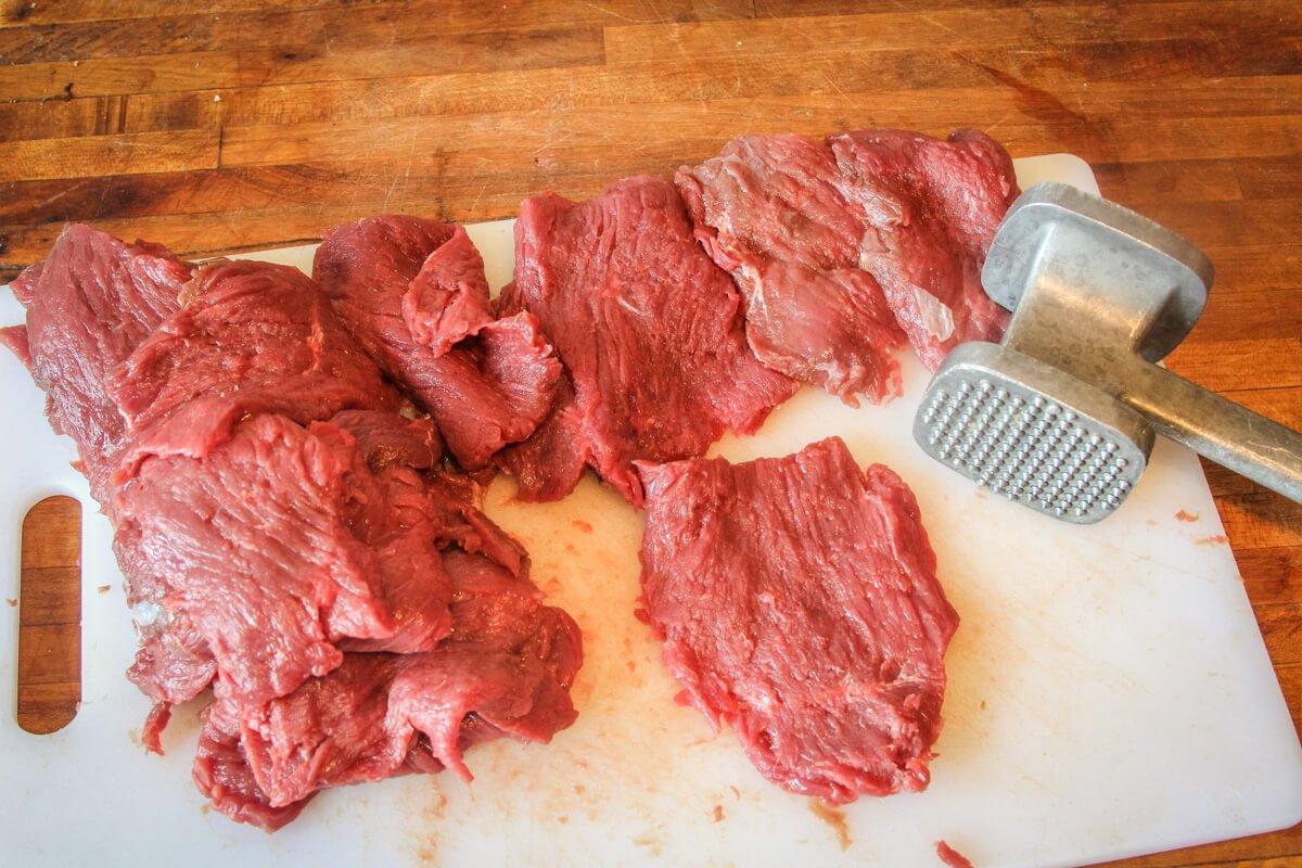 Slice the venison and pound to an even thickness.
