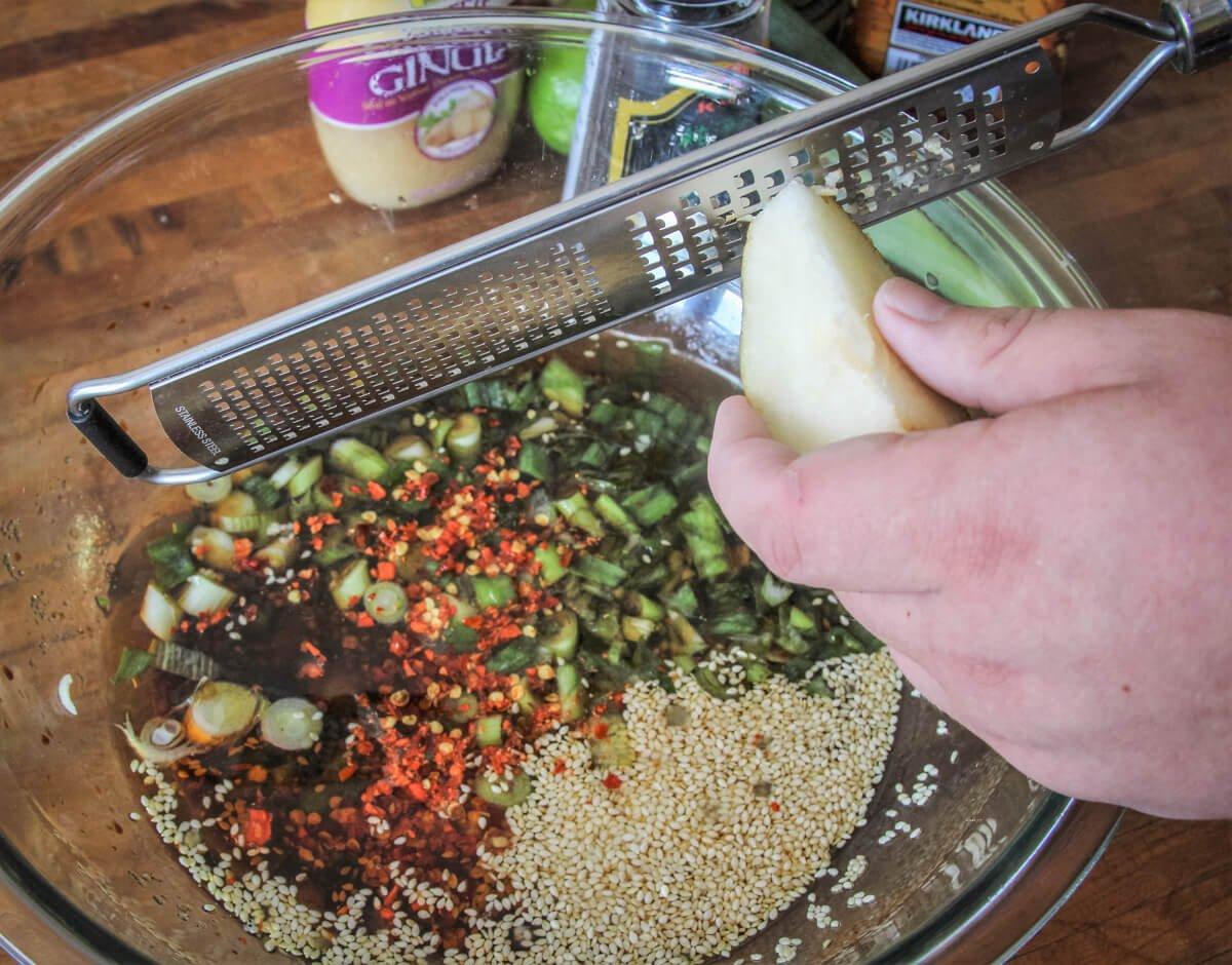 Grate the fresh pear into the marinade.