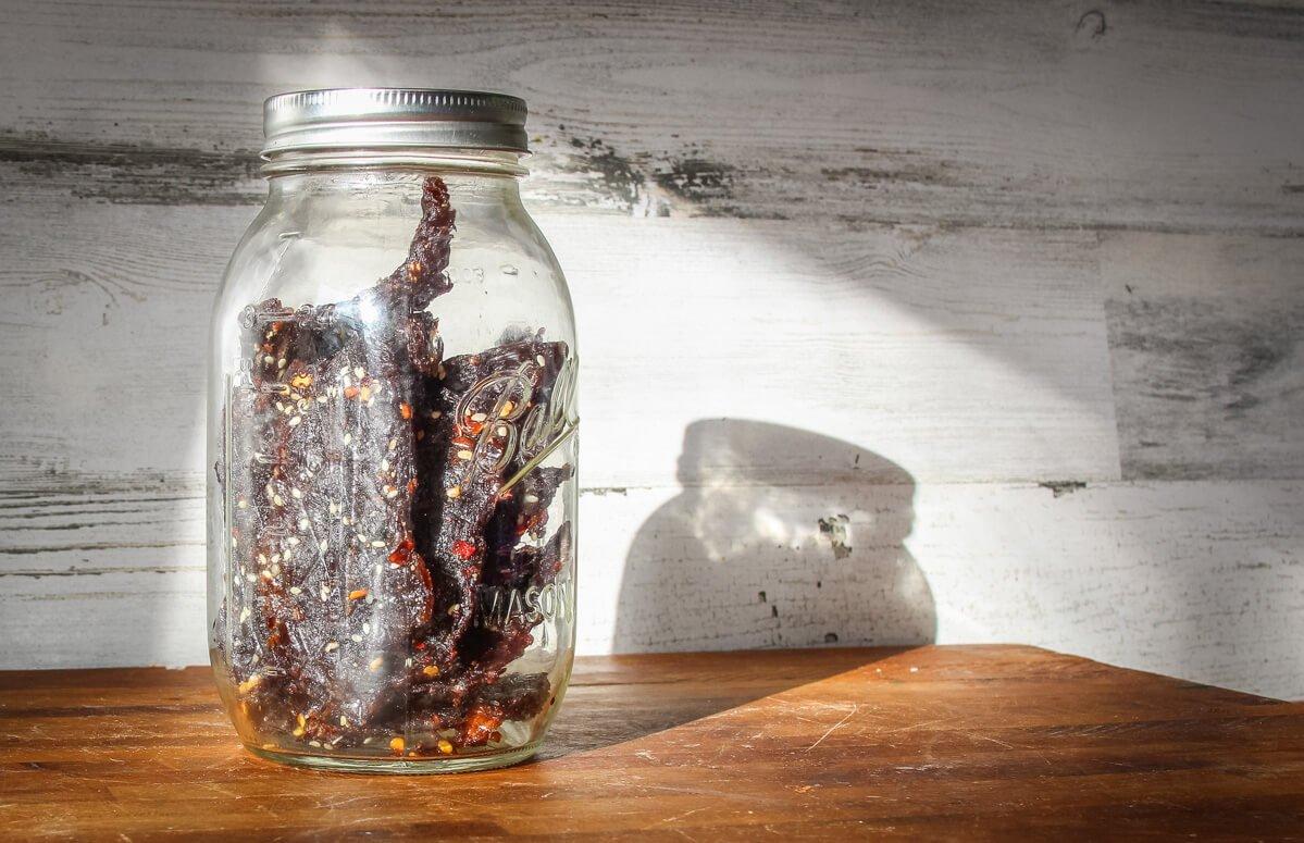 I like to store jerky in glass jars in the refrigerator.