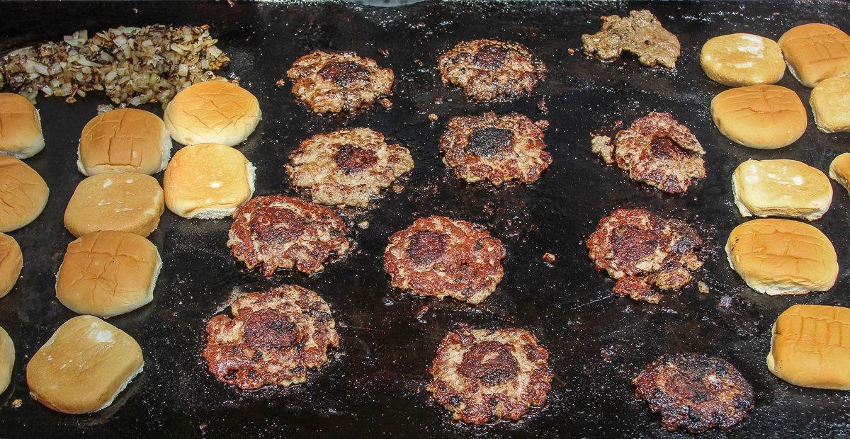 Smash the burgers onto a hot griddle to crisp.