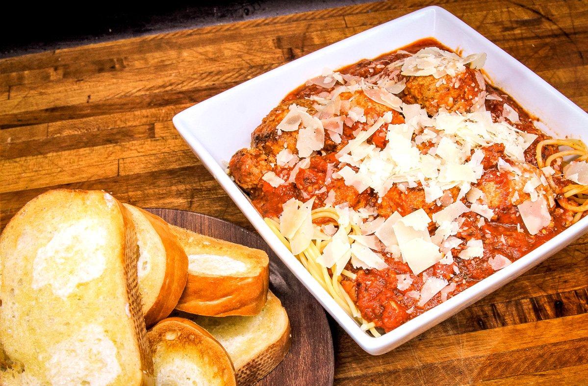 Serve the meatballs and sauce over pasta and top with Parmesan cheese.