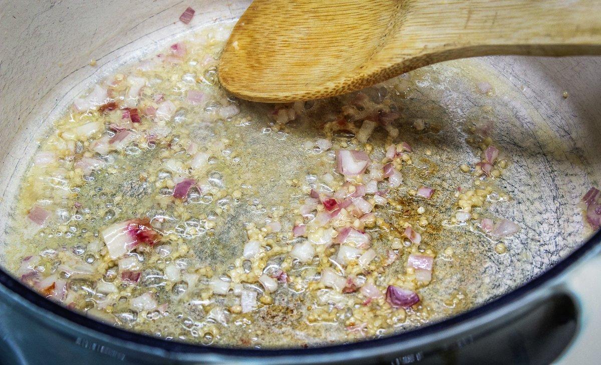 Sauté the shallots and garlic to start the sauce.