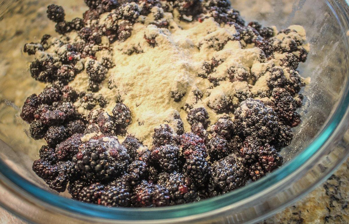 Toss the blackberries with a bit of flour and sugar.