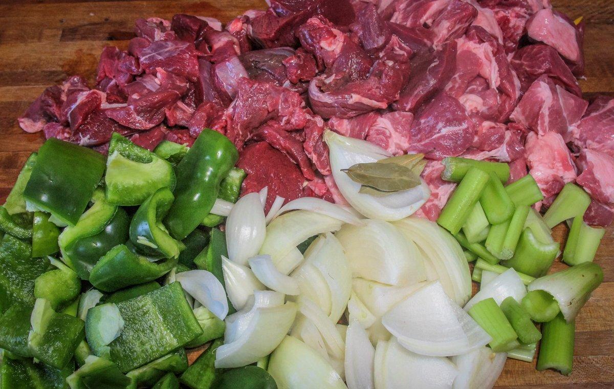 Start by boiling the pork, venison, onions, peppers and celery along with Cajun seasoning.