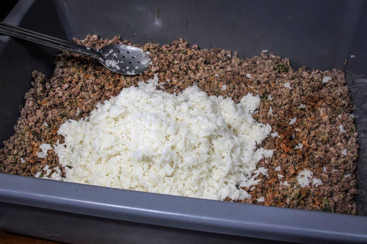 Add the rice and enough reserved stock to form a sticky paste when mixed.