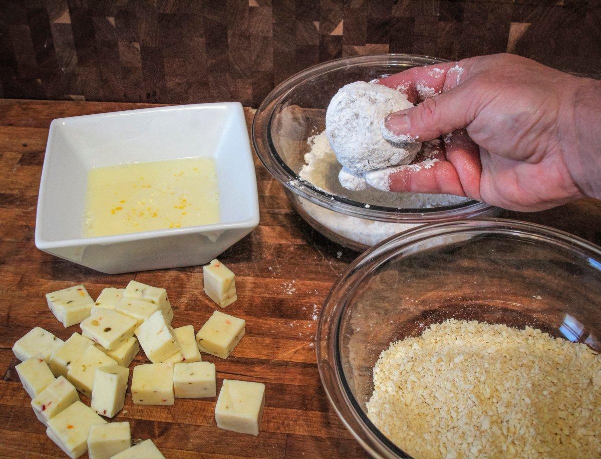 Dredge the ball in flour.