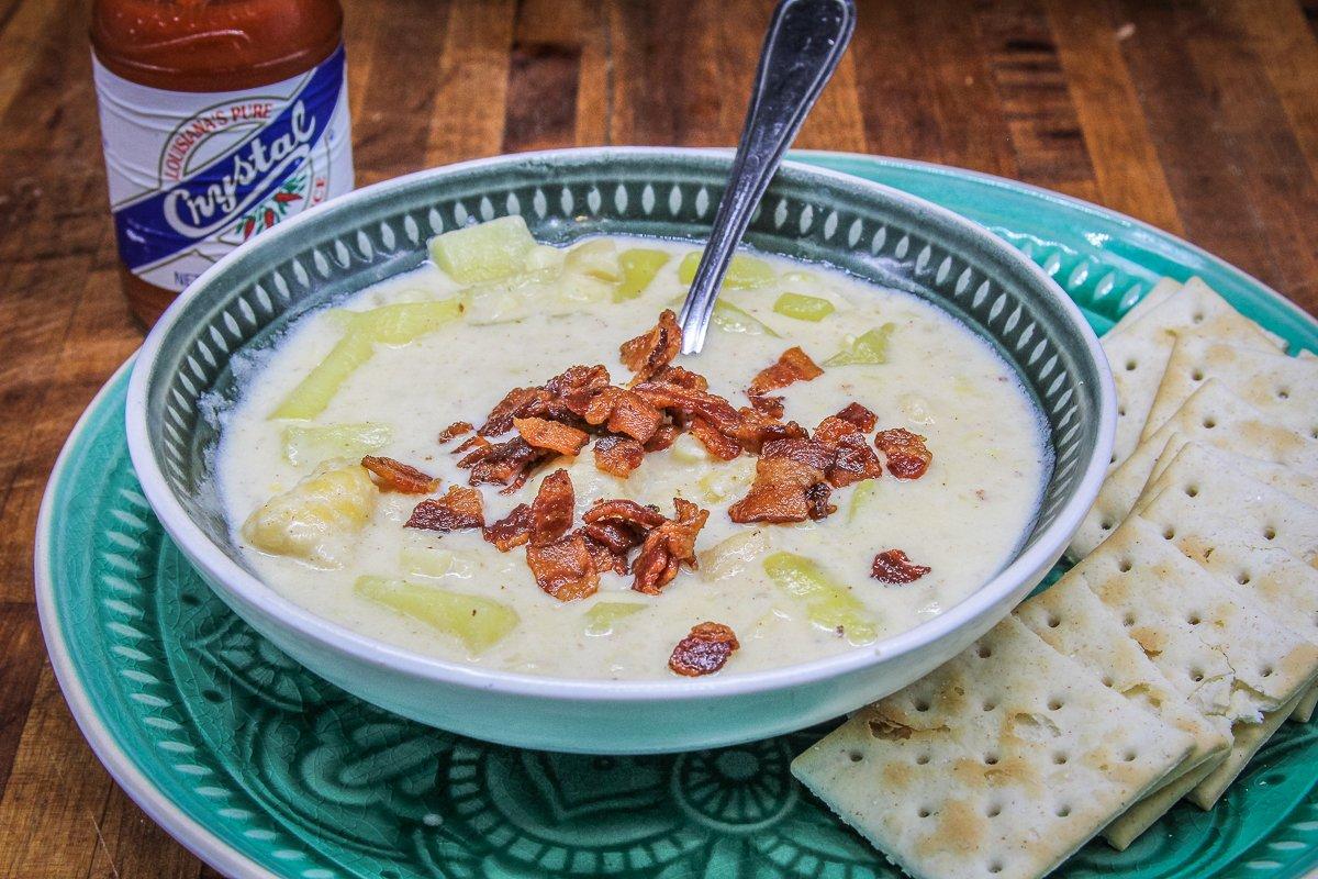 Top the chowder with the reserved bacon and serve with hot sauce and crackers.