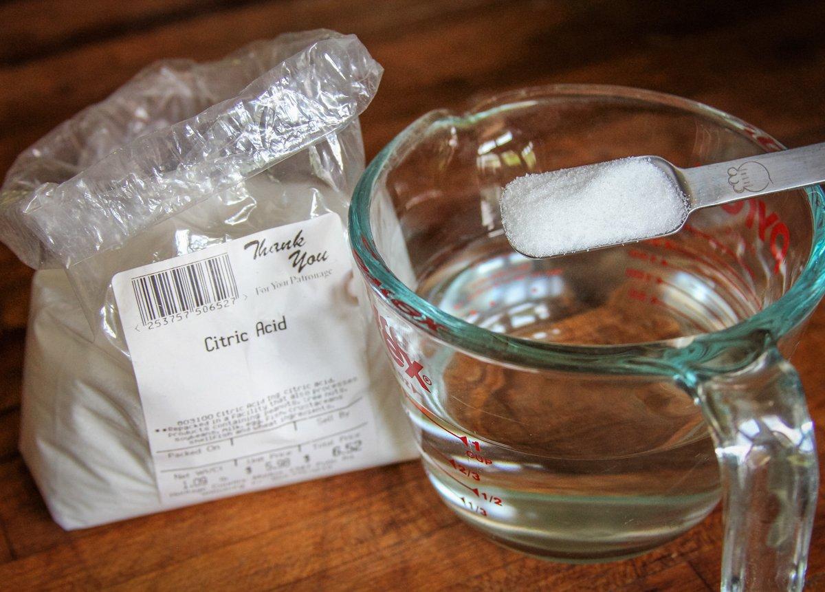 Dissolve the citric acid in non-chlorinated water.