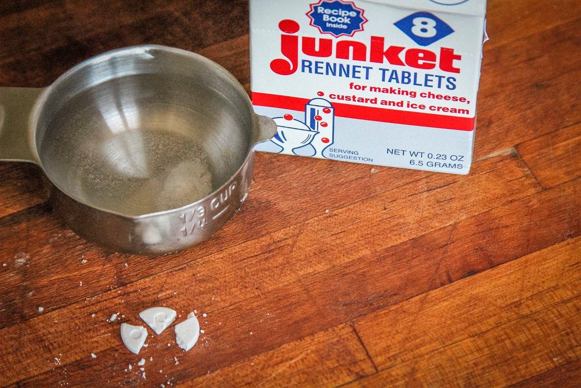 Dissolve 1/4 of a rennet tablet into non-chlorinated water.