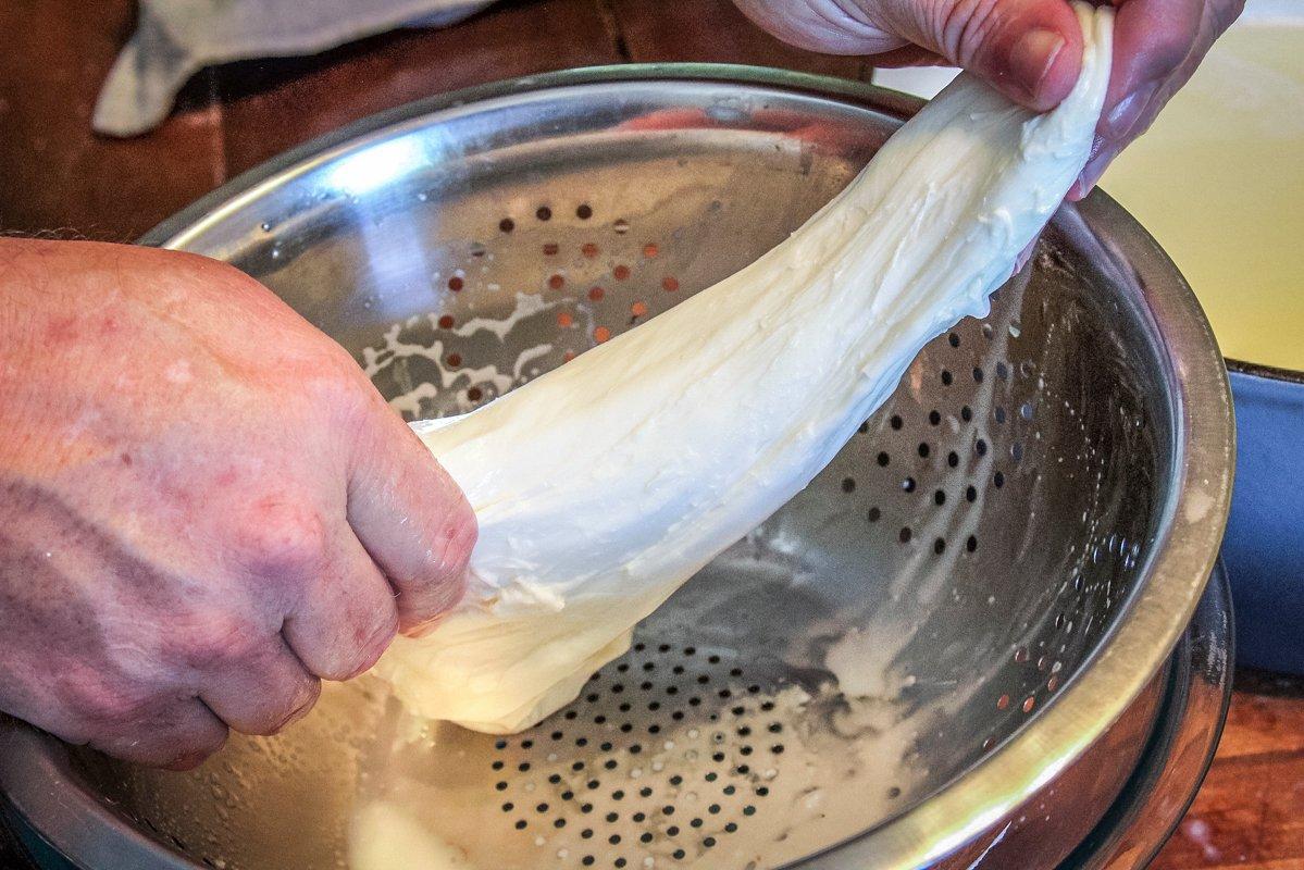 Stretch the cheese until it is shiny and firm.