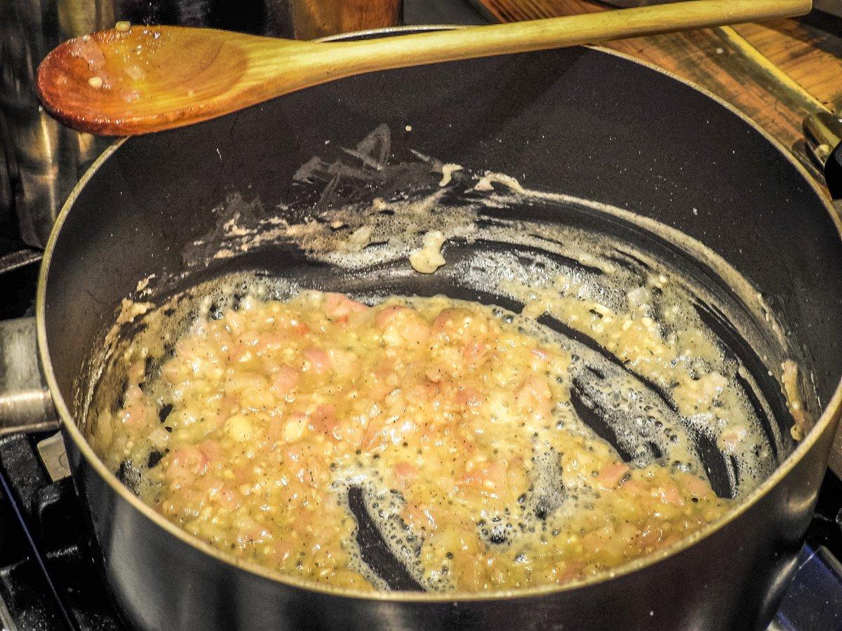 Slowly cook the butter, shallots and flour into a blonde roux.