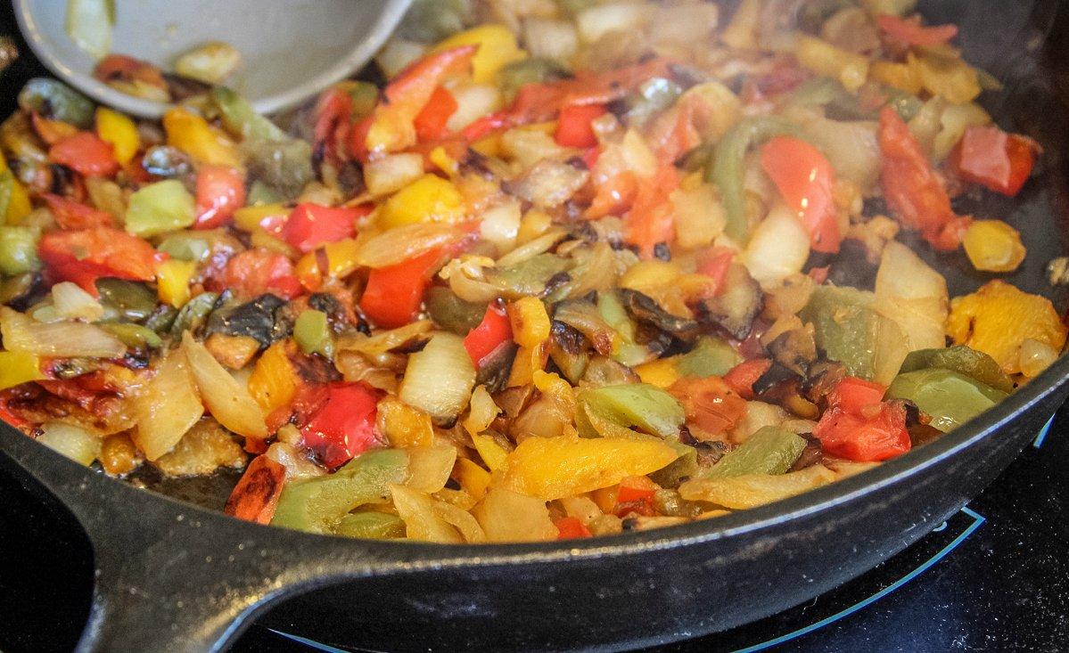 Saute the peppers and onions until completely soft and cooked through.