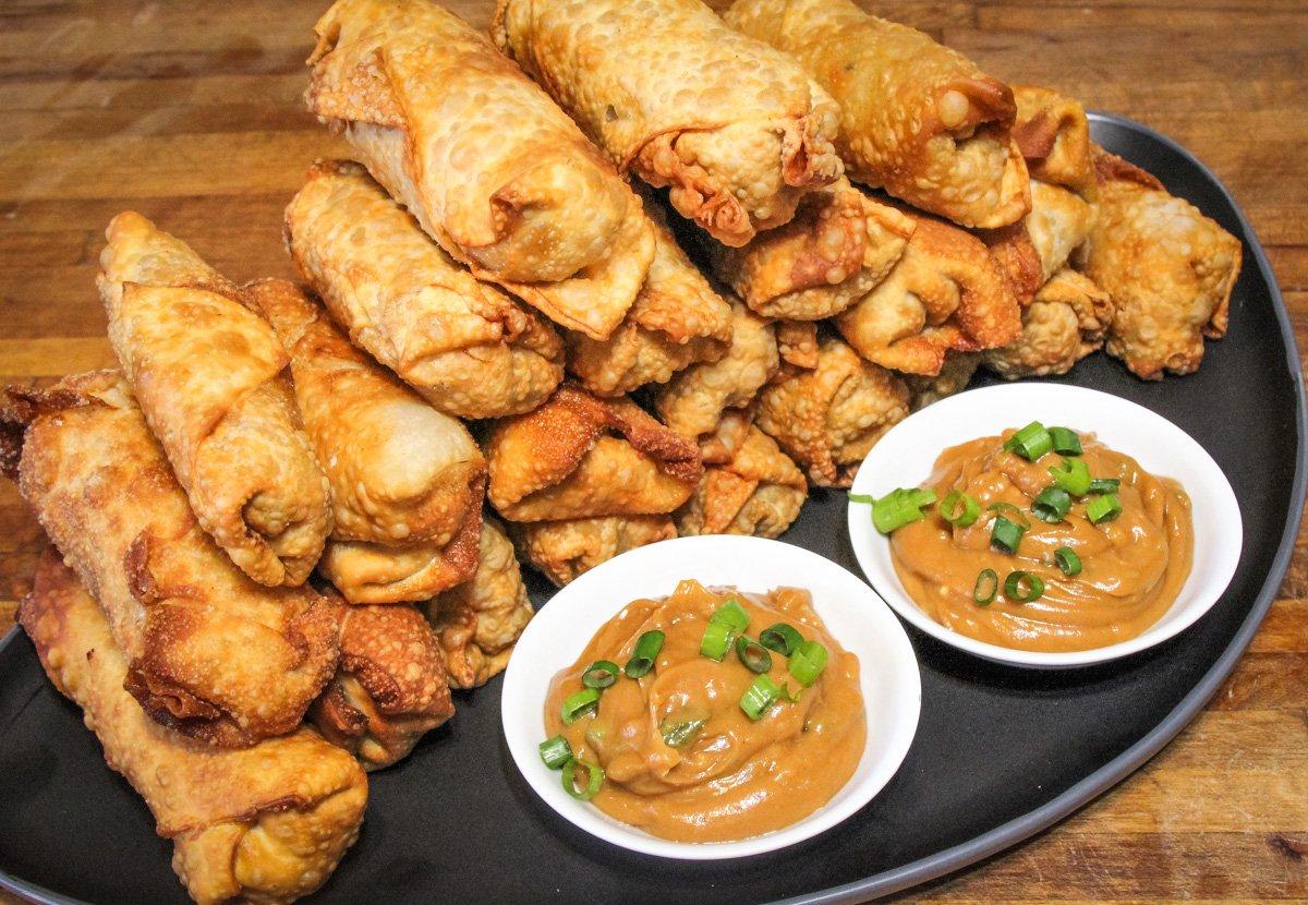 Serve the egg rolls with spicy peanut sesame dipping sauce.