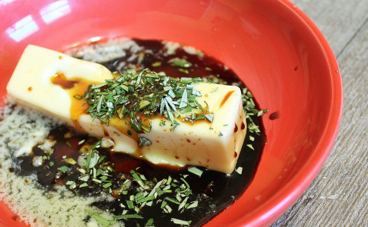 Brown the duck pieces in lard, then remove them from the pot.