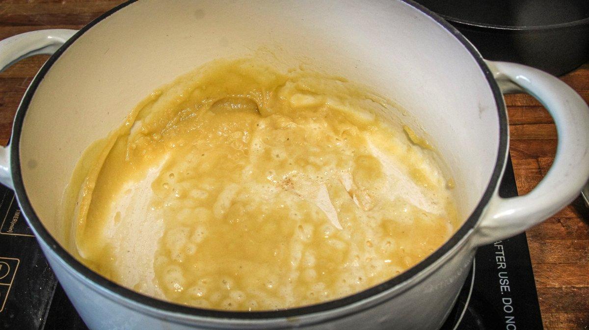 Start the cheese sauce by making a light roux from butter and flour.