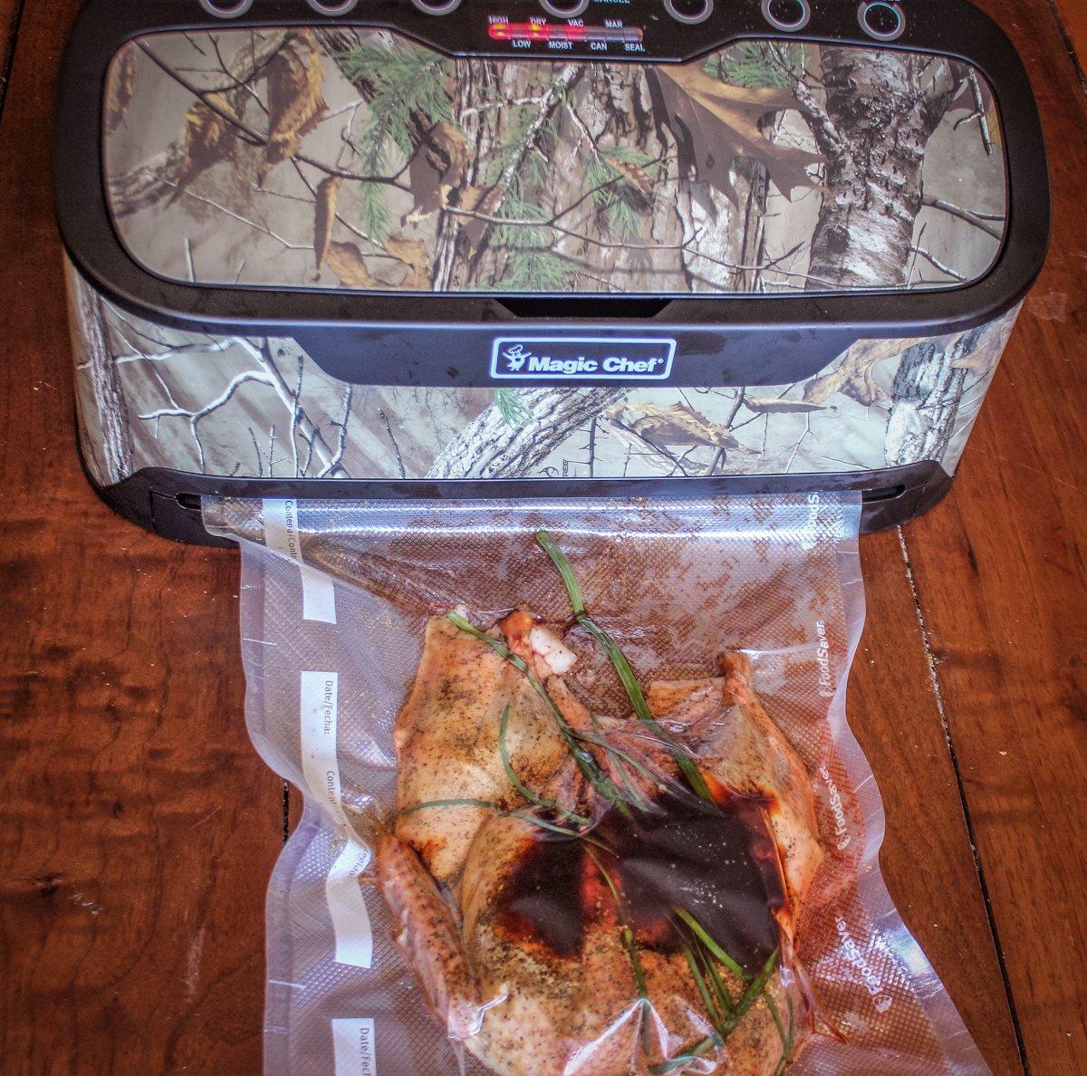 The new Magic Chef Vacuum Sealer has a handy bag compartment in the top and starts instantly when you insert the bag.