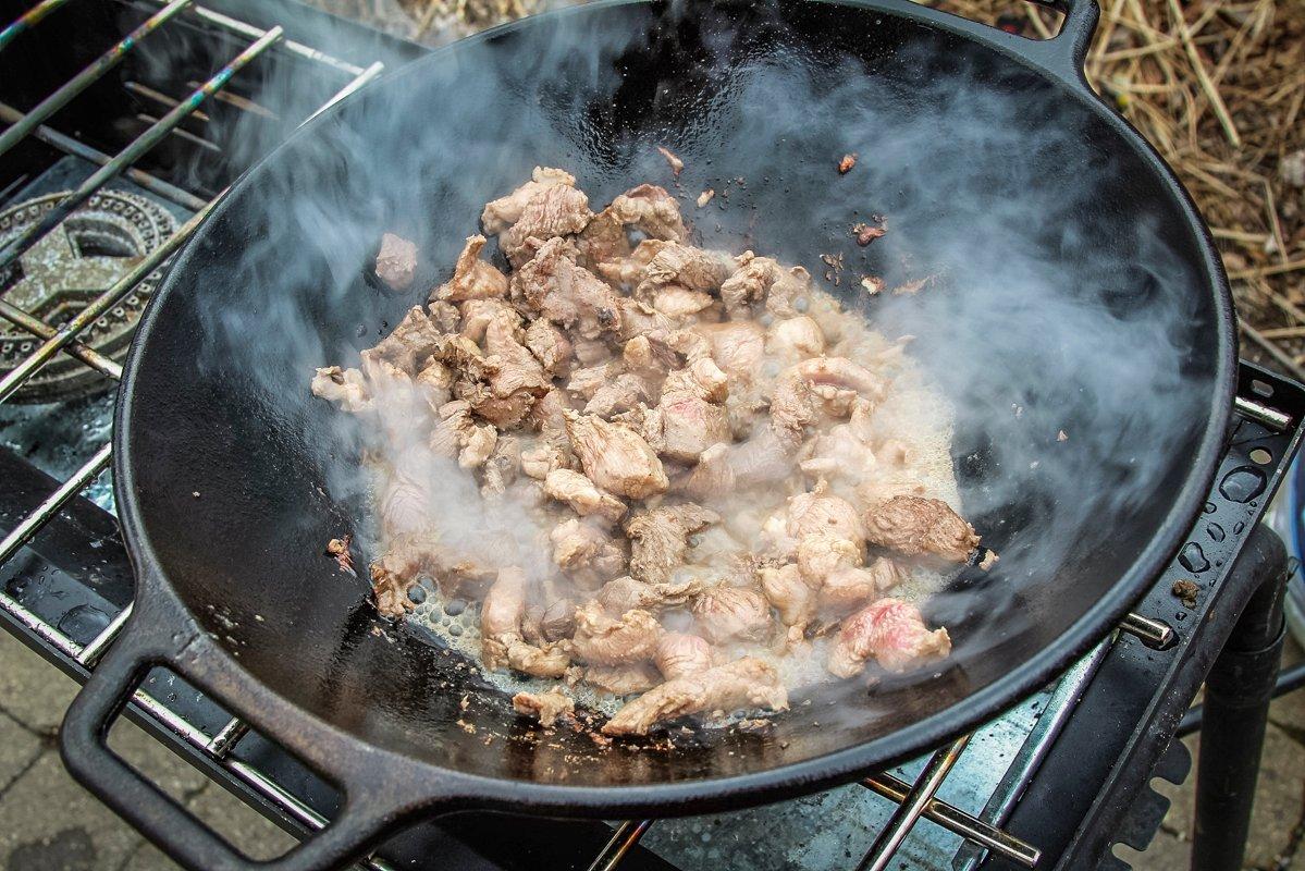 Start by stir frying the duck, then move it to a warm covered platter while you cook the vegetables.