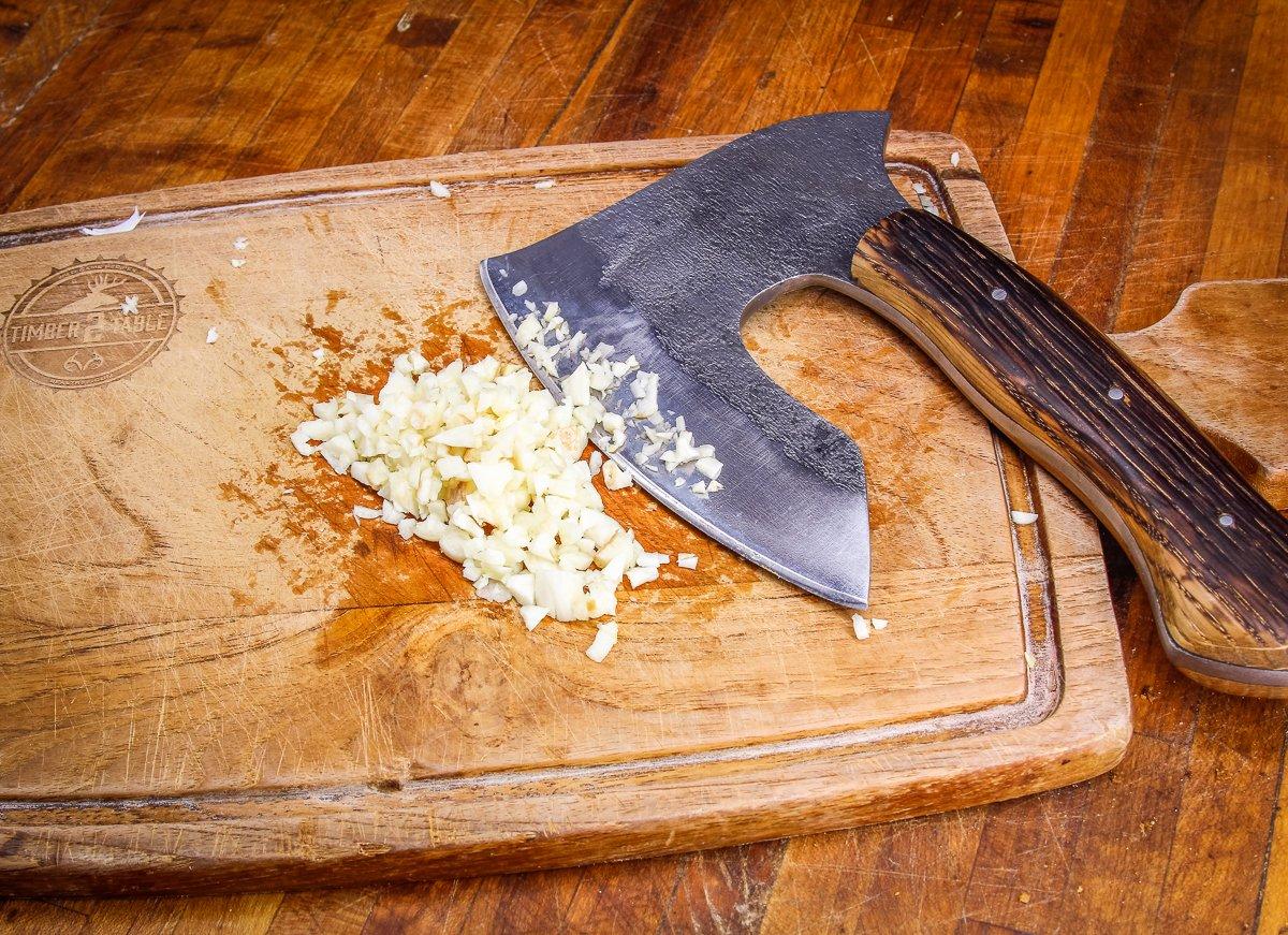 Finely chop 3 to 4 cloves of garlic for the sauce.