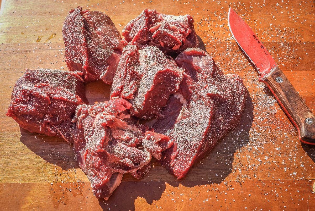 Cut the elk roast into smaller pieces for lots of surface browning and faster cooking.