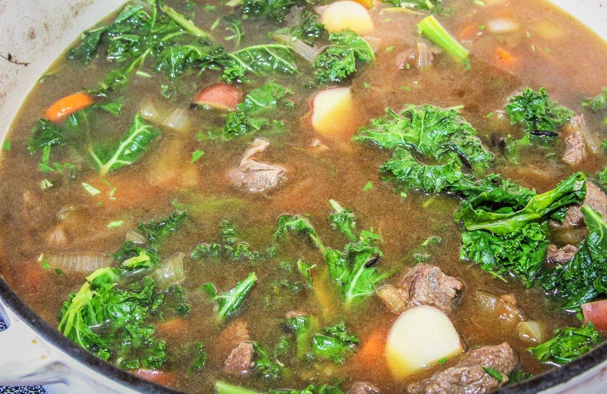 Simmer the meat for an hour, then add the wild rice, potatoes, kale and remaining ingredients.