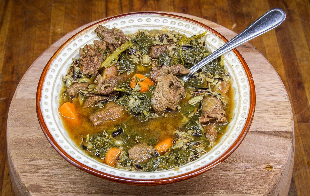 Tender elk meat, wild rice, potatoes, carrots, and kale make a hearty stew to warm you up on a cold winter's night.