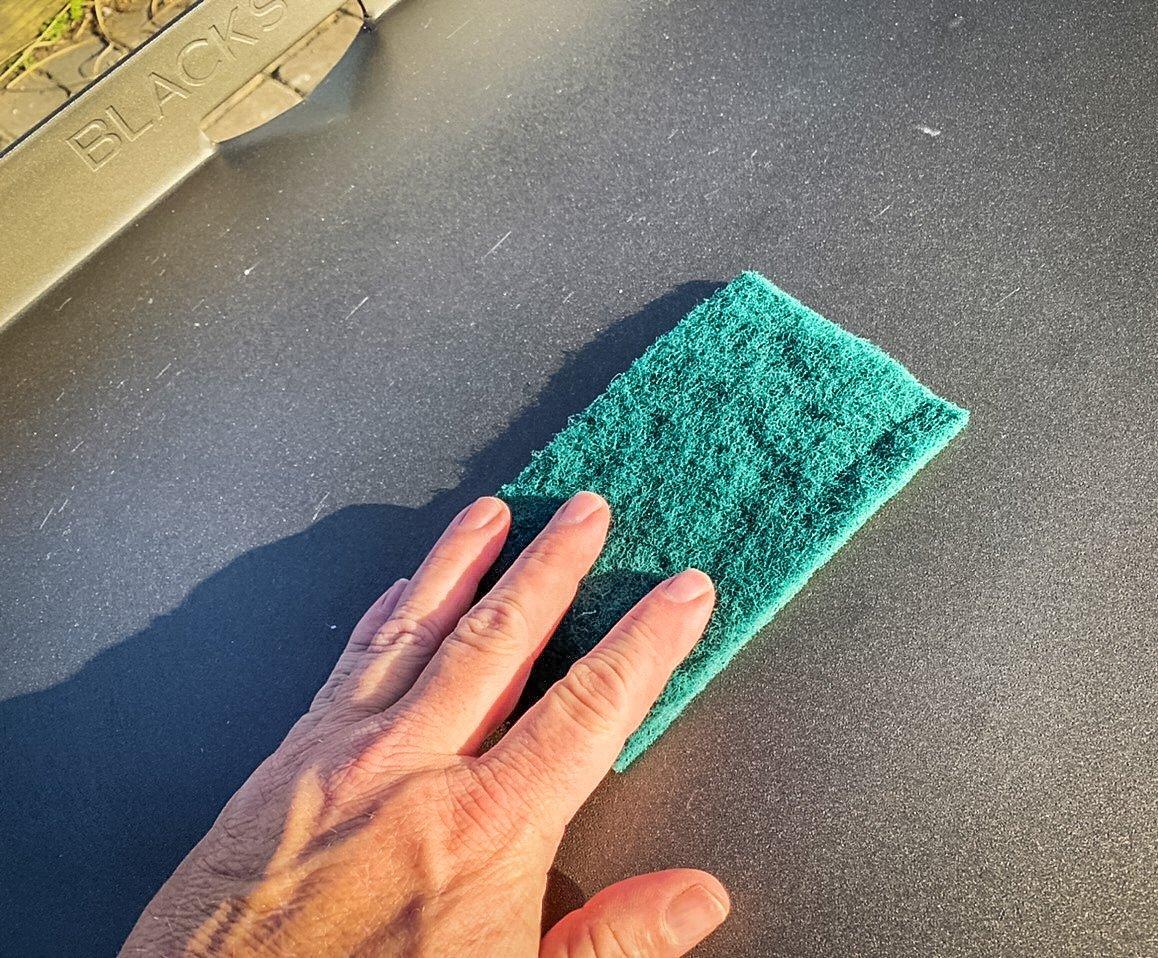 Use a Scotch Brite scouring pad to remove any rough spots.
