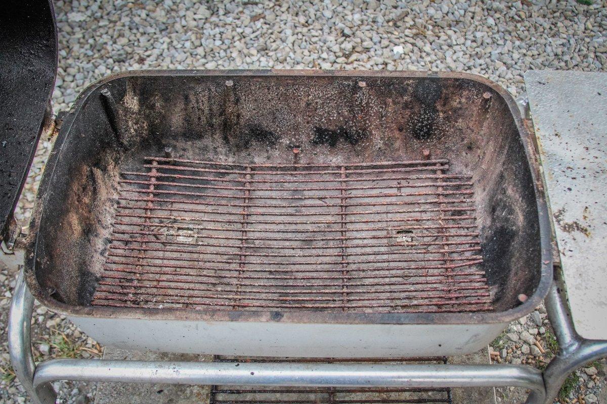 Look your grill over closely to see if any parts like this charcoal rack need replacing.