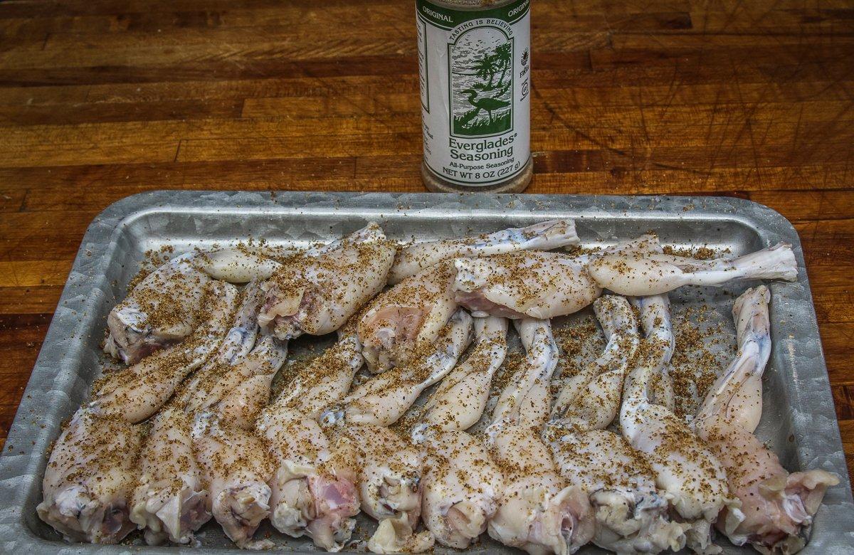 Season the frog legs with Everglades Seasoning Rub.