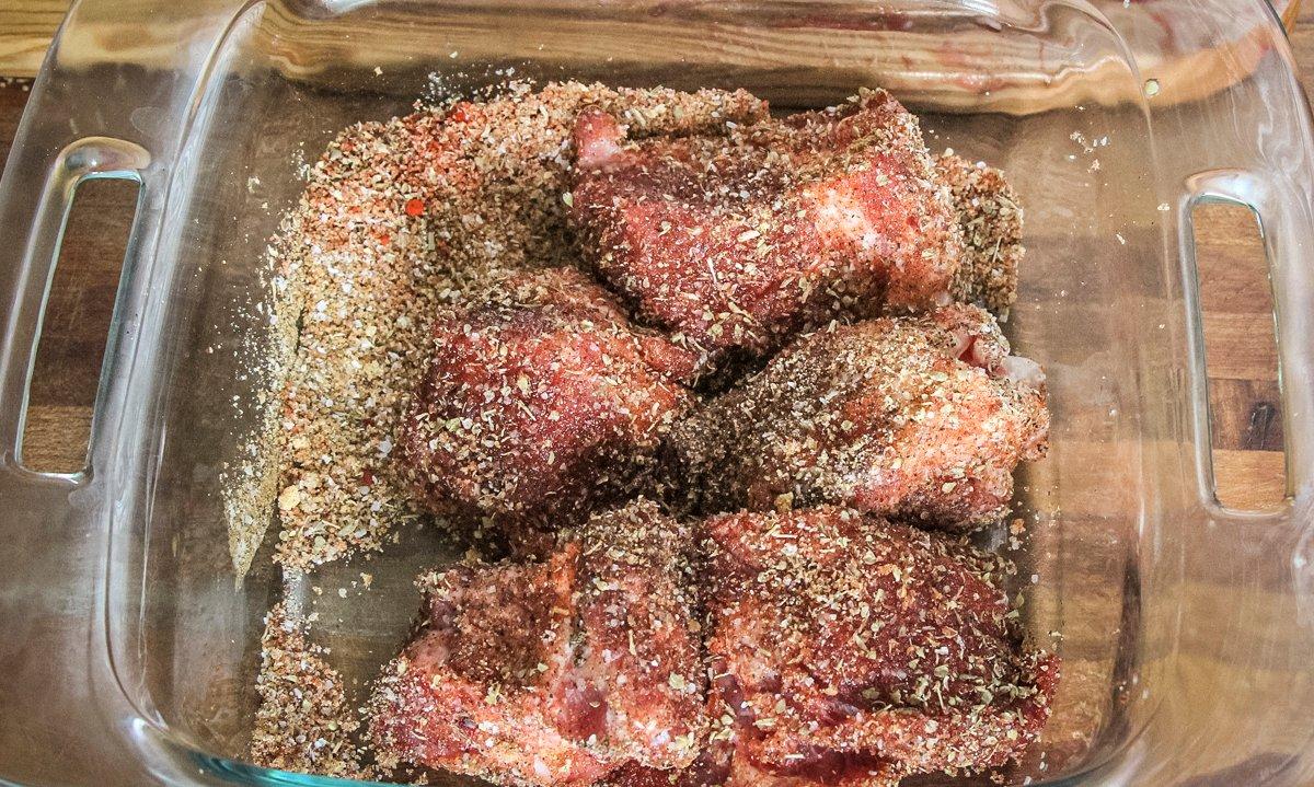 Season the pork with the dry rub mixture.