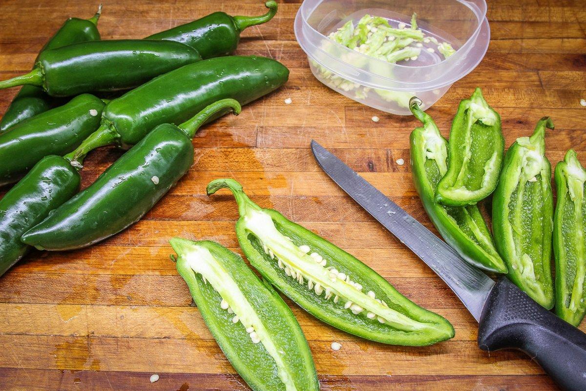 Remove the seeds and veins from the peppers to lower the heat.