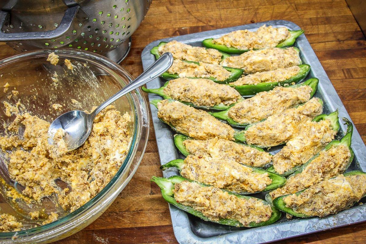 Spoon the stuffing mixture into the pepper halves.