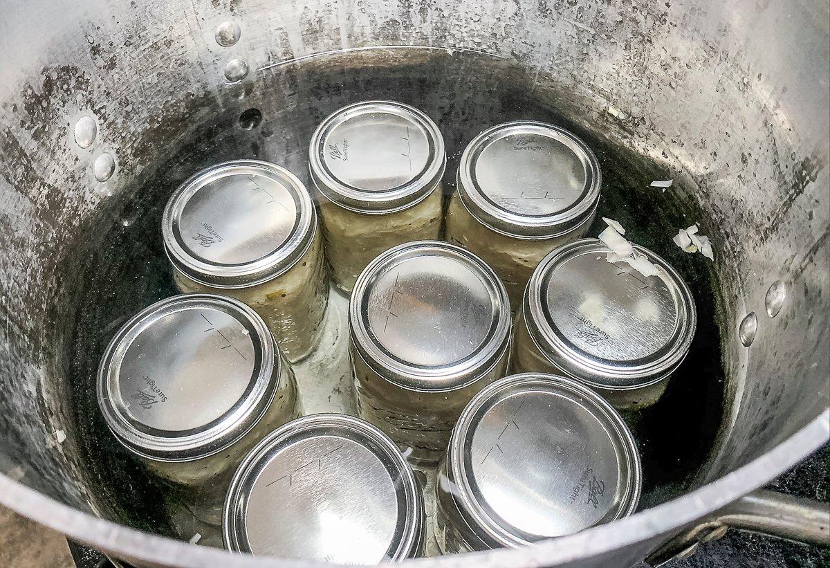 Boil the jars for 25 minutes, then move to a towel-lined shelf to cool and seal.