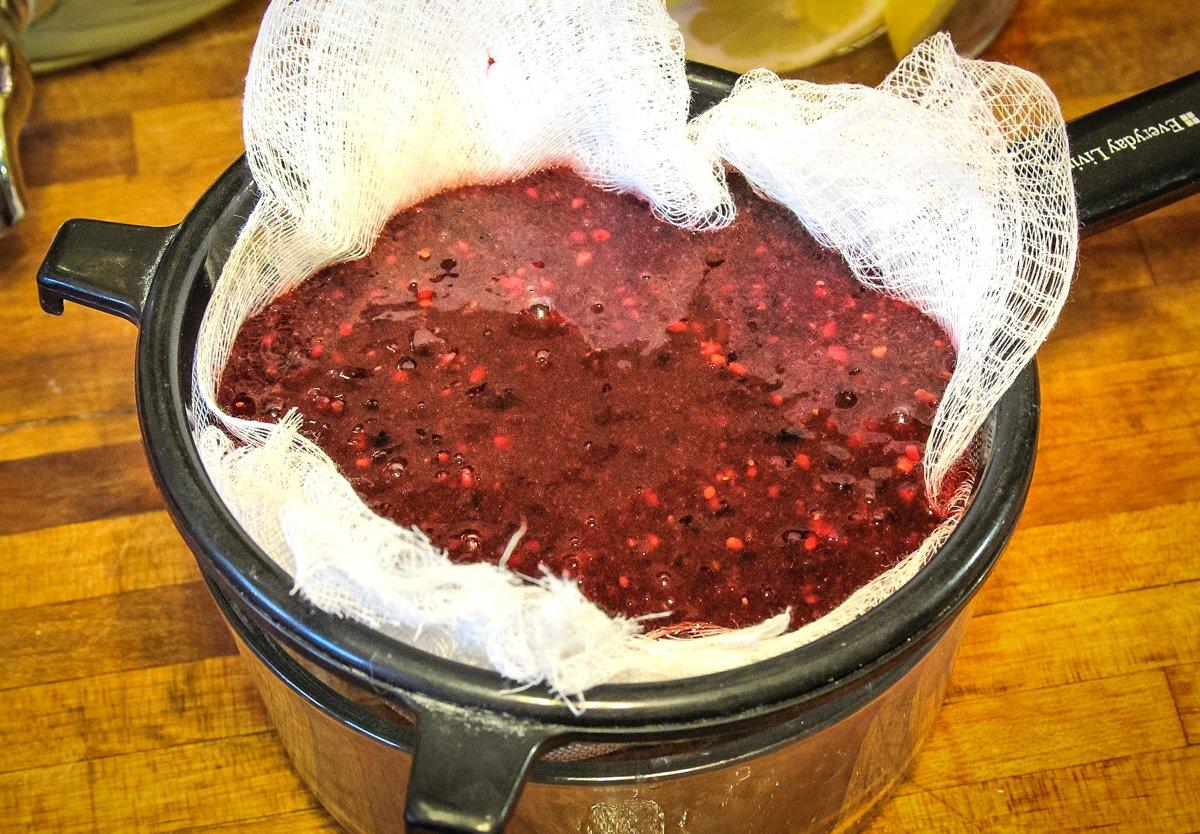 Press the puree through cheesecloth and a strainer to filter out the blackberry seeds.