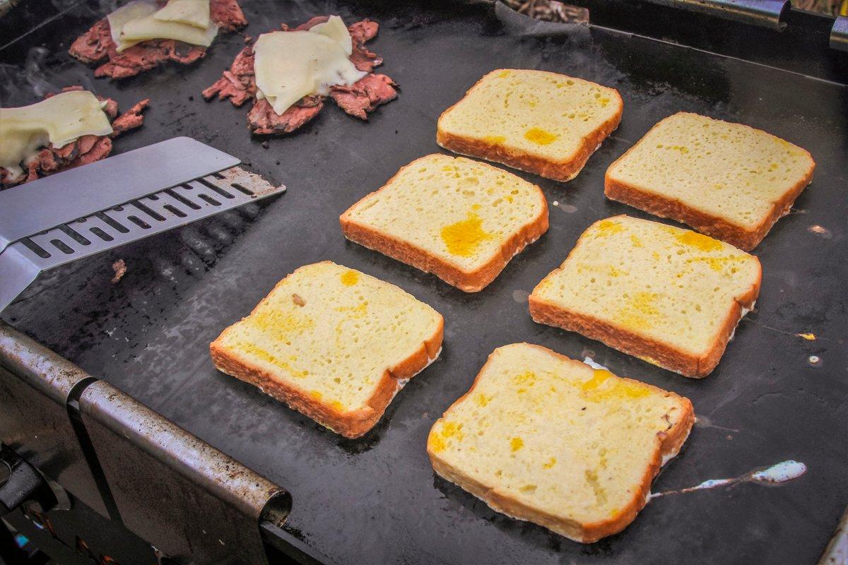 Dip the bread into the beaten egg, then fry in butter.